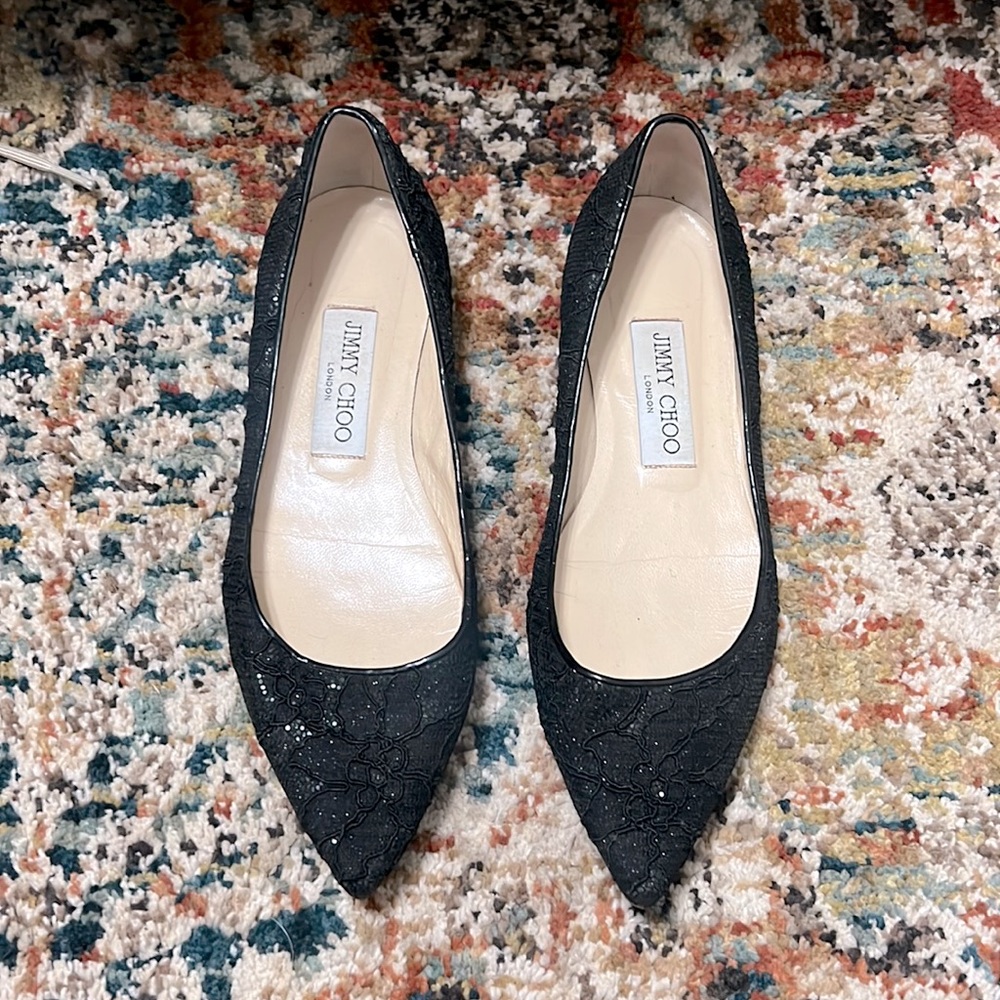 Jimmy Choo black lace pointy toe flats.